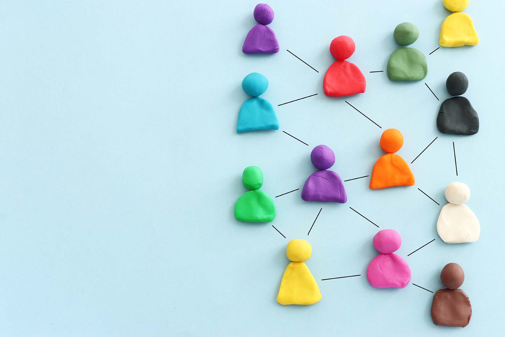 Multi colored people icons connected to show Human Connection and B2B Lead Generation